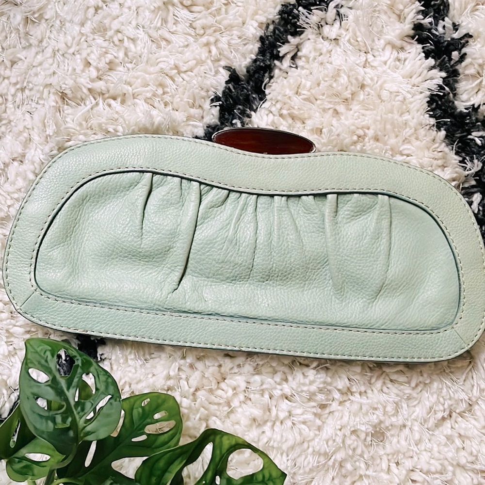 Mint green clutch